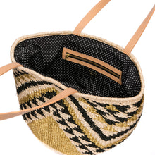 Load image into Gallery viewer, Queen of the Hills Millie Tote, handwoven from natural plant fibers and polyester cord, featuring cow leather handles, a polka dot cotton lining, and functional zippered and open pockets.
