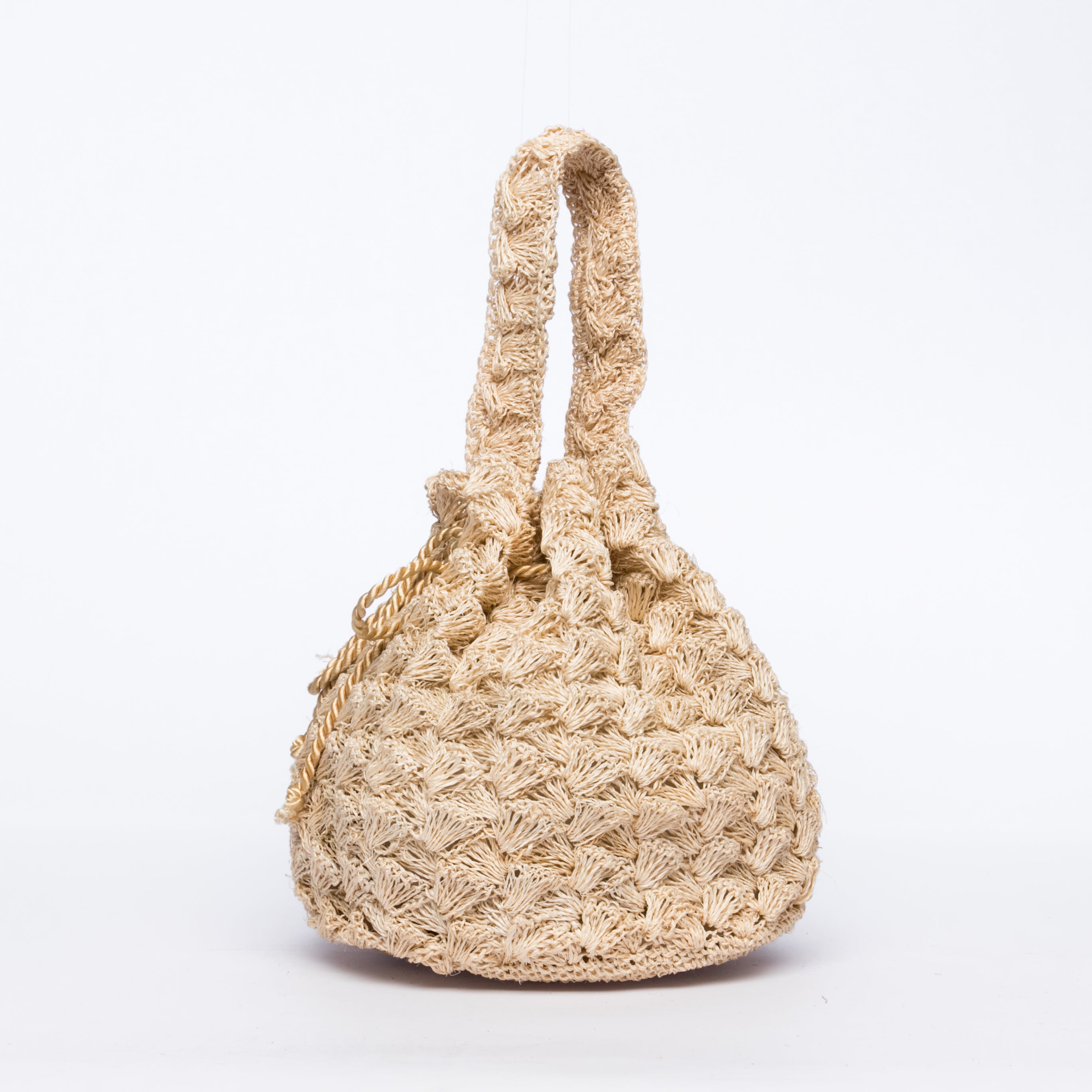 Rie Pouchette wristlet and shoulder bag, handcrafted from sustainable abaca plant fiber with delicate crochet detailing and adjustable leather strap for versatile use.