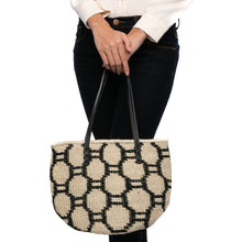 Load image into Gallery viewer, Beehive Tote Bag handwoven from natural plant fiber with leather handles and polka dot lining. Stylish and sustainable.
