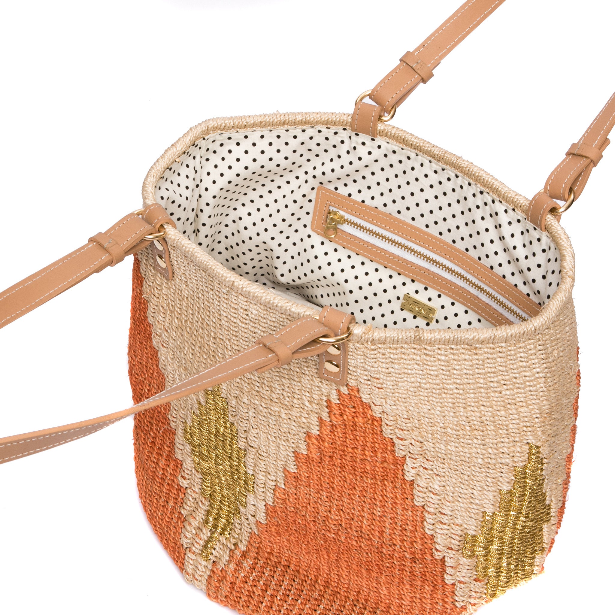Sunrise Rae Tote, made from natural plant fibers and gold-colored polyester cord, with cow leather handles for durability and style.