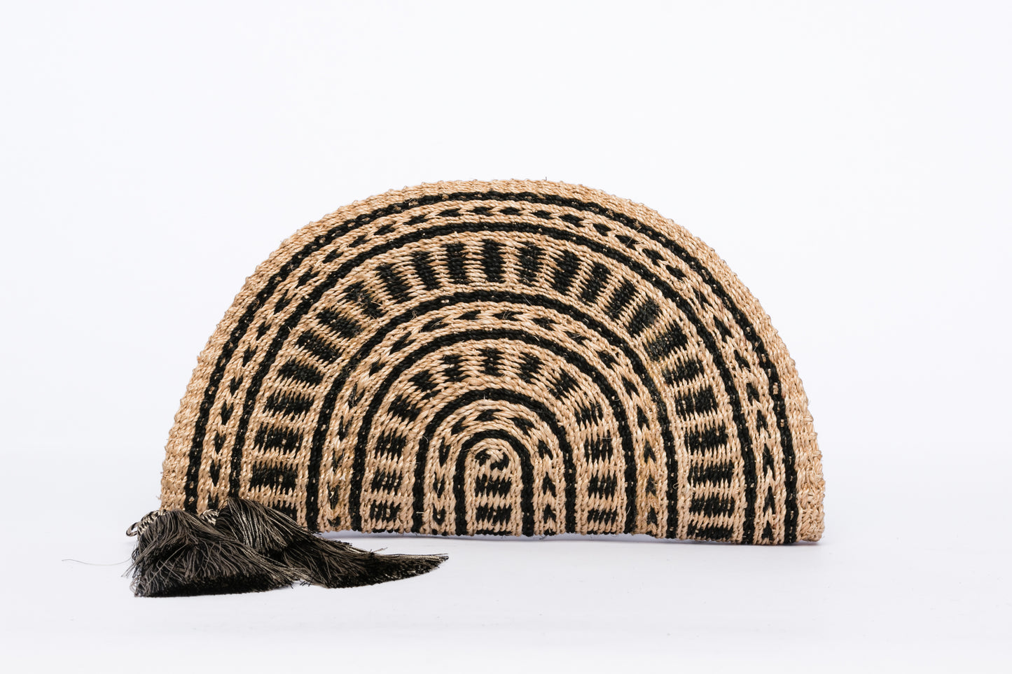 Tiffany Fan Clutch made from 100% abaca, handwoven with eco-friendly craftsmanship, featuring a sleek design and sustainable materials.