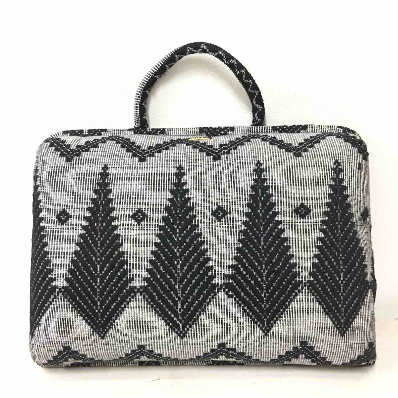 Hazel Inabel Black Feather Laptop Pillow made from traditional Abel Iloco handloomed fabric with a faux suede non-slip top and convenient handle for easy portability.