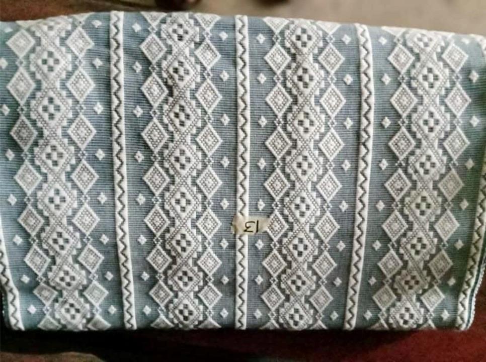 Hazel Inabel Blue Diamond Laptop Pillow made from traditional Abel Iloco handloomed fabric with a faux suede non-slip top and convenient handle for easy portability.