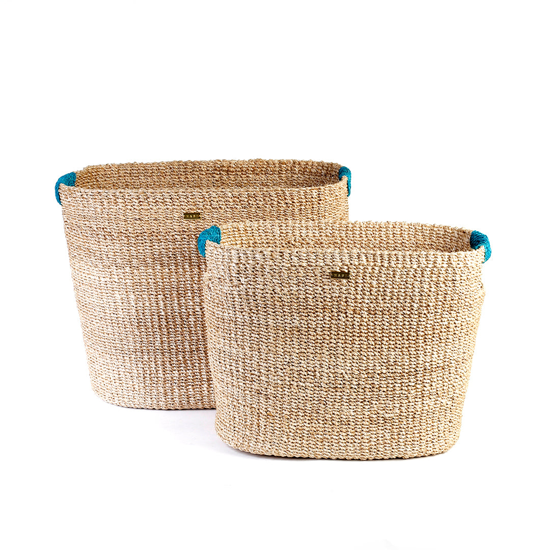Ivy Oval Storage Baskets Set of 2, handcrafted from natural plant fibers, shown in small and large sizes for stylish and eco-friendly home organization.