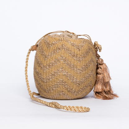 Larone Kate Circle Shoulder Bag featuring intricate zigzag embroidery on natural plant fiber, polka dot cotton lining, and cow leather handles for a comfortable fit. Perfect for stylish city outings.