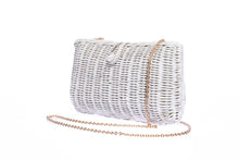 Load image into Gallery viewer, Myra Wicker Clutch White, handcrafted from rattan with a brass chain strap and a soft linen-cotton lining, perfect for day and evening wear.
