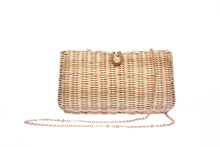 Load image into Gallery viewer, Myra Wicker Clutch Natural handwoven from rattan, featuring a brass chain strap and a soft linen-cotton lining, perfect for both day and night occasions.
