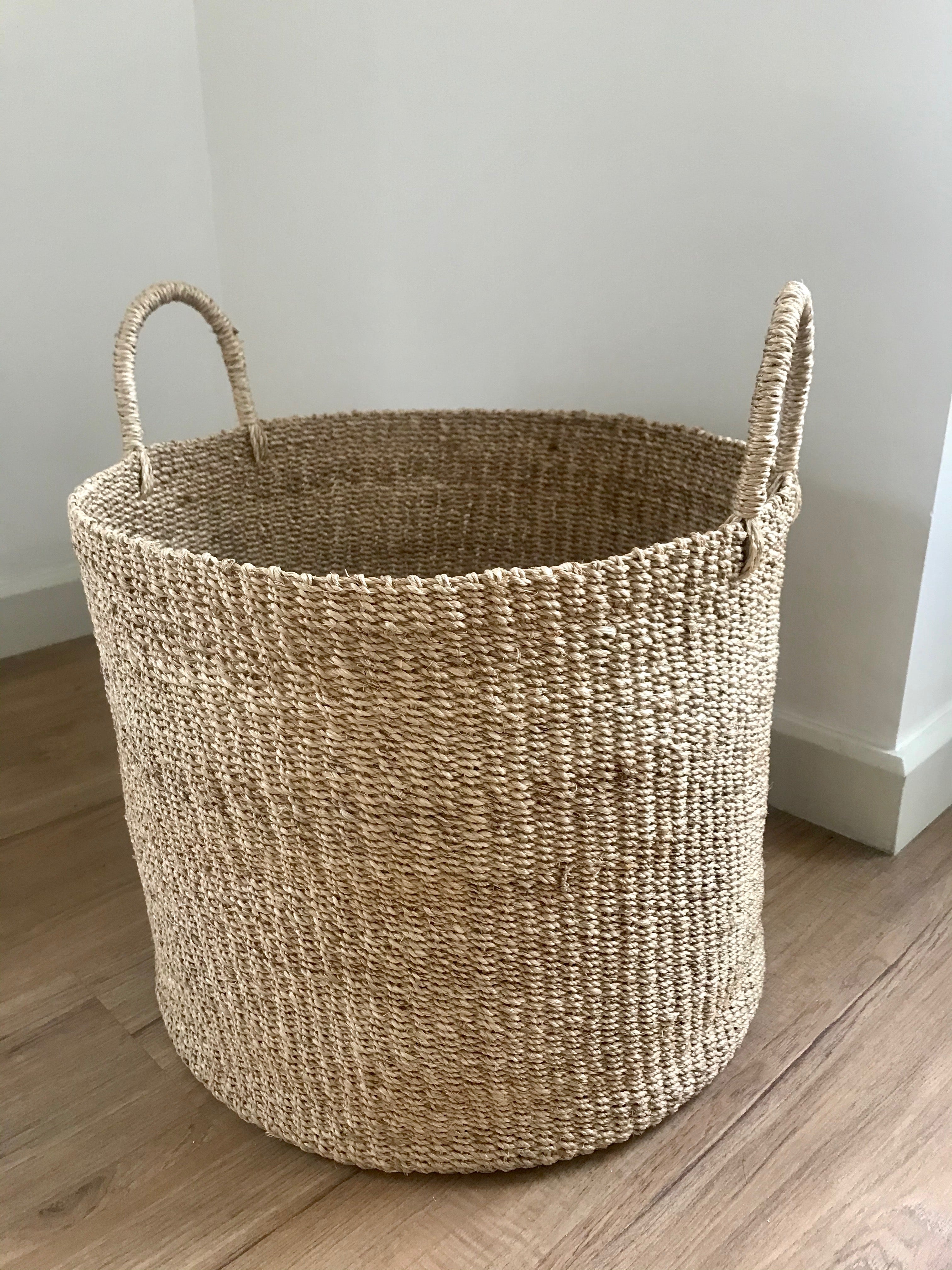 Camille Round Storage Basket made from 100% natural plant fiber, ideal for laundry, toy storage, and organizing essentials. Eco-friendly and stylish design.