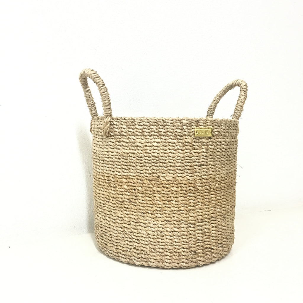 Dinah Catch-All Basket made from 100% natural plant fiber, ideal for organizing keys, spices, bath essentials, or as a planter cover.
