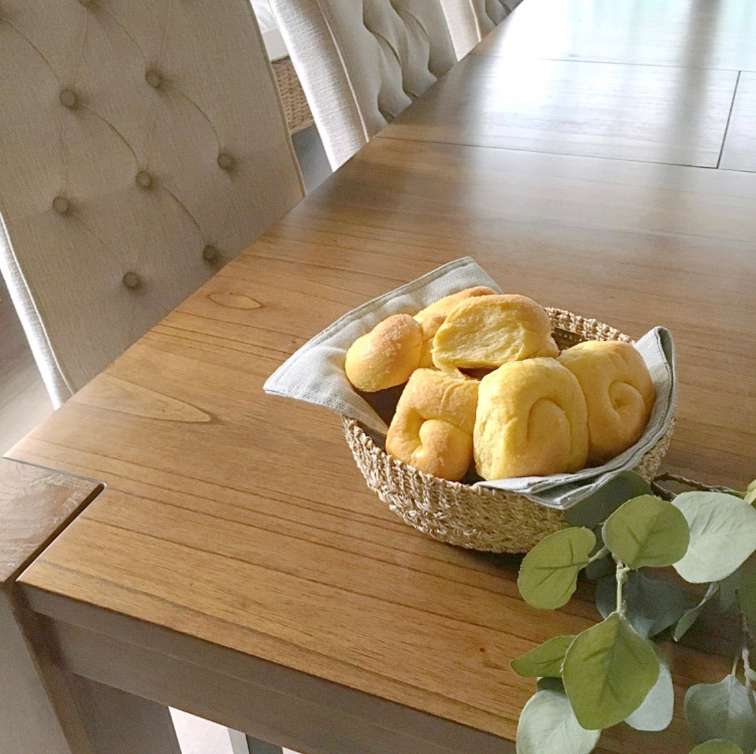 Handwoven natural plant fiber Myra Catch All tray for organizing jewelry, keys, and other essentials.