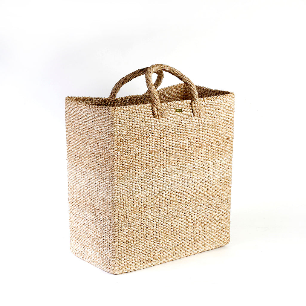 Serene Rectangle Storage basket, handcrafted from natural plant fibers, dimensions 17" Length x 10" Width x 19" Height. Ideal for storing laundry, sports equipment, and seasonal items.