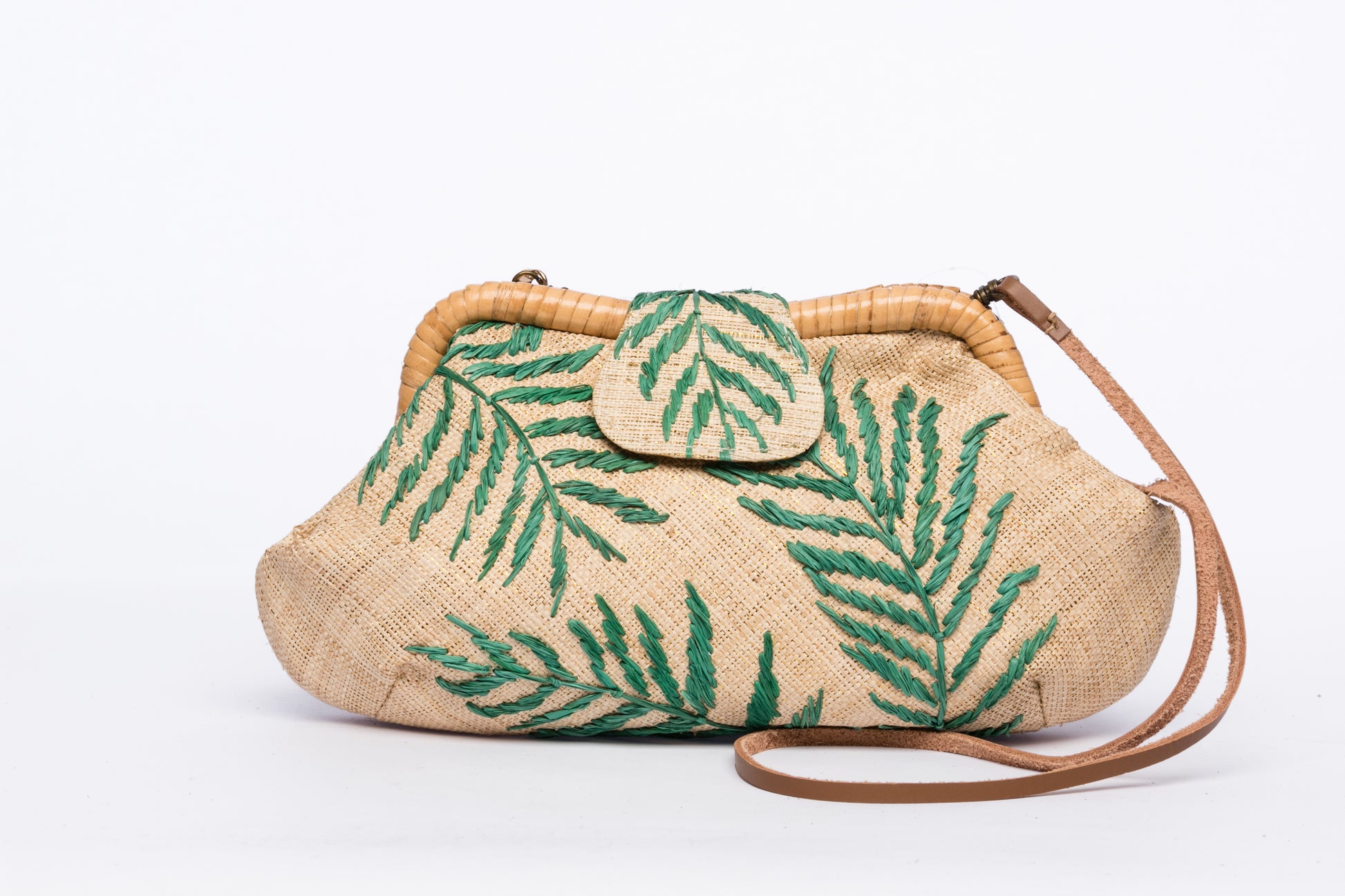 Palm Leaves Signature Larone Purse, handwoven from raffia with embroidered daisies and a rattan frame, featuring a leather strap for a sustainable, chic accessory.