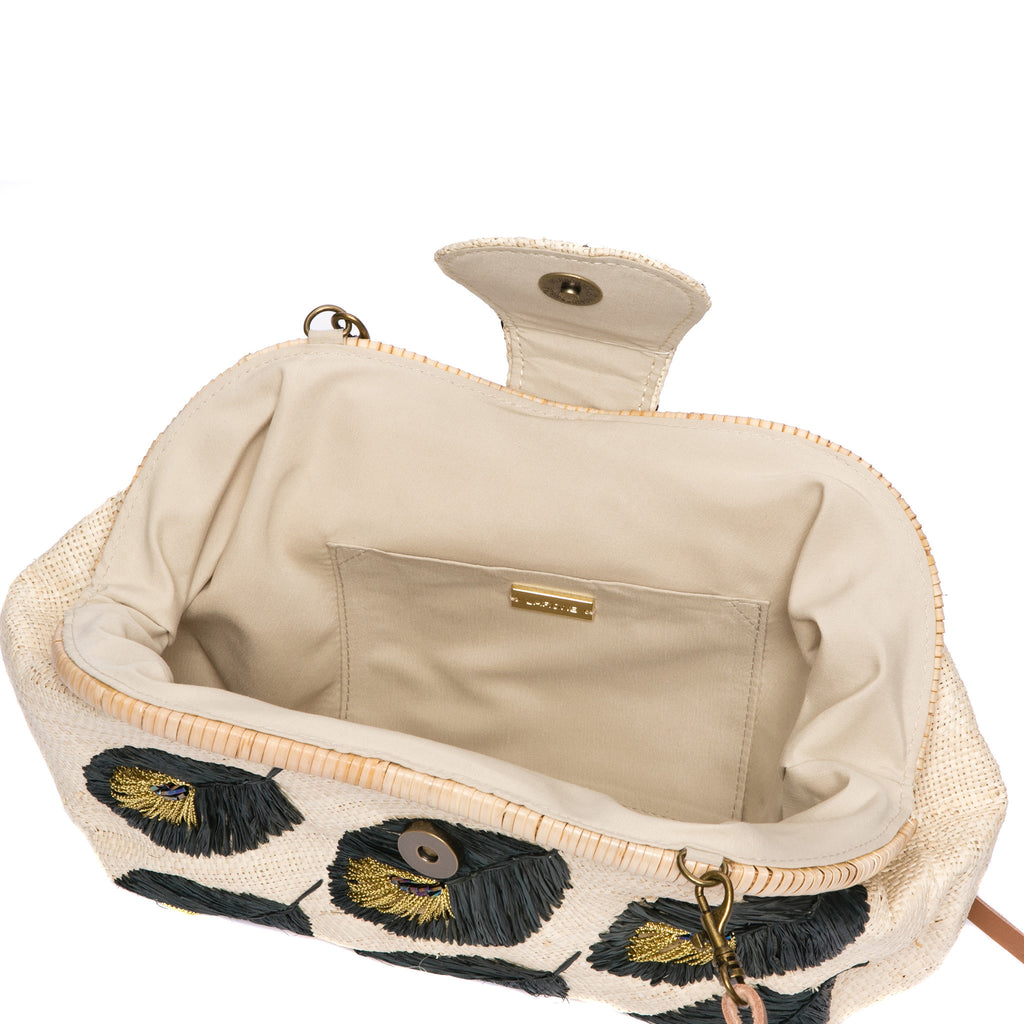 Peacock Feathers Signature Larone Purse, handwoven rattan frame with hand-embroidered raffia, cord, and seed beads, featuring a removable leather strap for versatile styling.