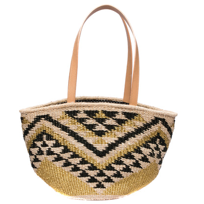 Queen of the Hills Millie Tote, handwoven from natural plant fibers and polyester cord, featuring cow leather handles, a polka dot cotton lining, and functional zippered and open pockets.