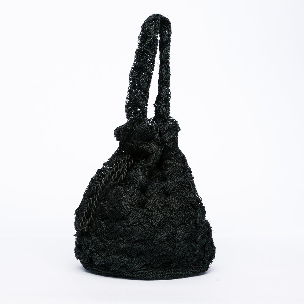Rie Pouchette Black wristlet and shoulder bag, handcrafted from sustainable abaca plant fiber with delicate crochet detailing and adjustable leather strap for versatile use.