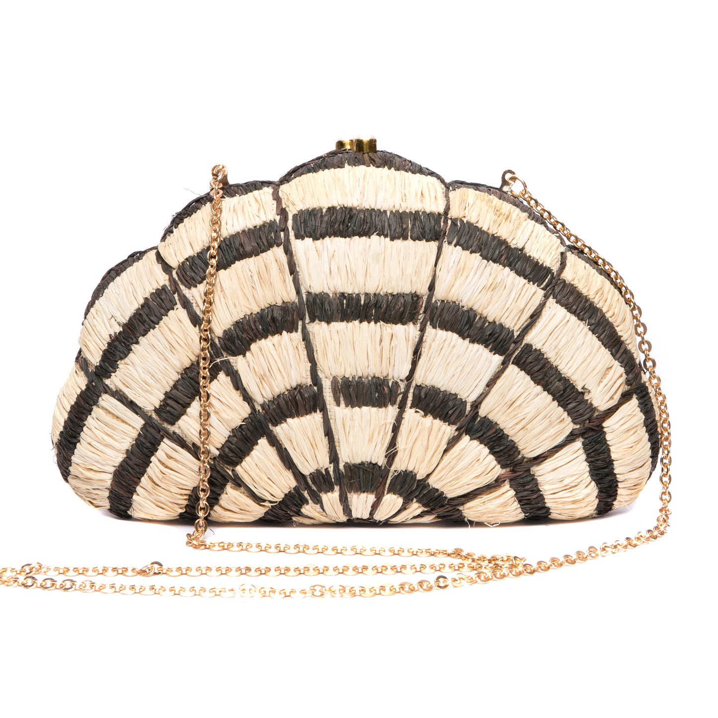 Seashell Karuna Clutch featuring hand-embroidered raffia fiber, freshwater pearls wrapped in brass, and a brass drop-in chain strap for versatility.