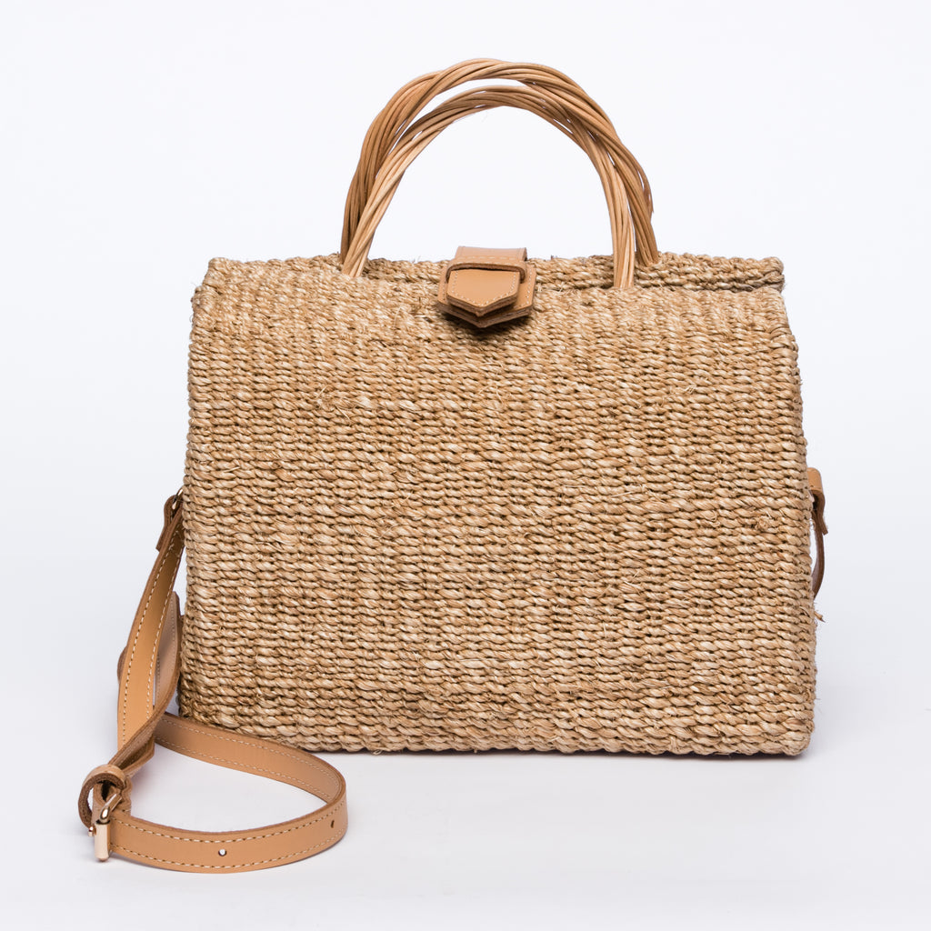Sustainable Nina Shoulder Bag made from natural abaca fiber with a leather strap, offering versatility and eco-friendly style.