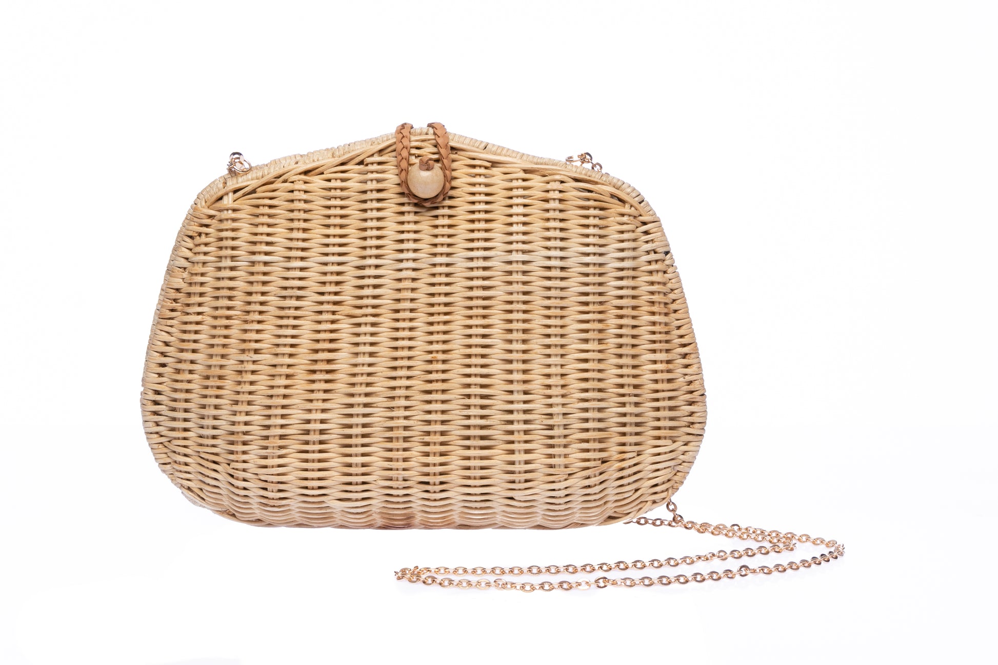 Stephanie Wicker Clutch made from handwoven rattan with a removable brass chain strap, perfect for day or night wear.