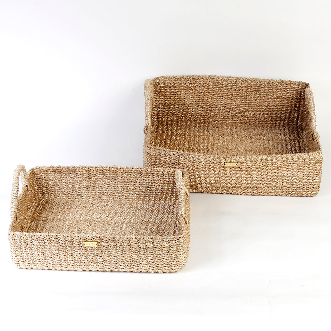 Stephanie Trays Set of 2, crafted from 100% natural plant fiber, ideal for organizing and displaying items around the home.