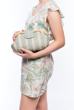 Load image into Gallery viewer, Grey Skye Signature Clutch – Handwoven raffia and rattan clutch with hand embroidery, featuring a removable leather strap for versatile styling.

