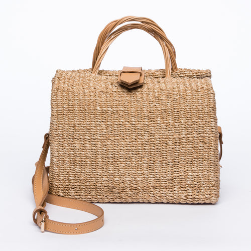 Sustainable Nina Shoulder Bag made from natural abaca fiber with a leather strap, offering versatility and eco-friendly style.