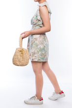 Load image into Gallery viewer, Rie Pouchette wristlet and shoulder bag, handcrafted from sustainable abaca plant fiber with delicate crochet detailing and adjustable leather strap for versatile use.
