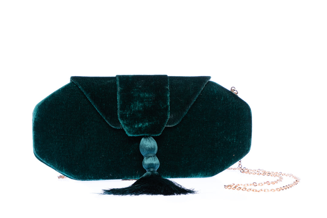 Velvent Evening Tassel Clutch with a silky tassel and brass chain strap, designed for evening events with a handmade, sophisticated finish.